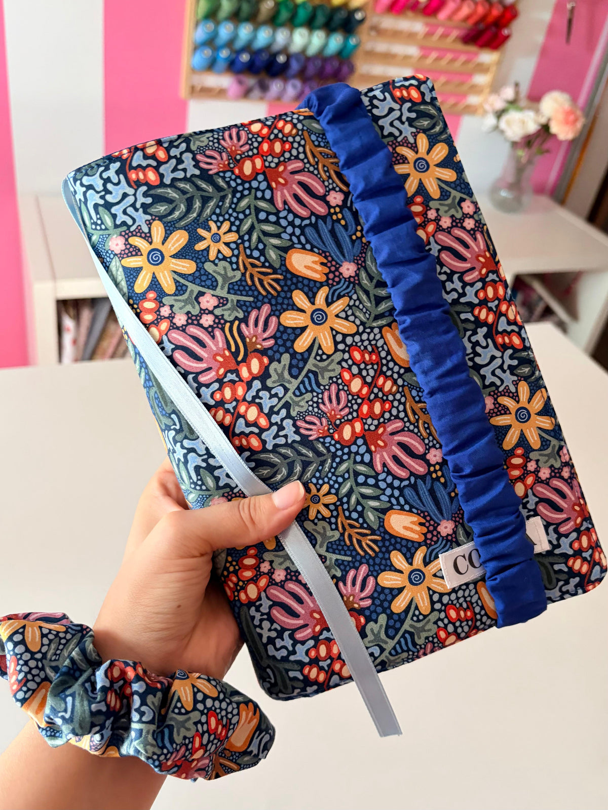 Funda de libro de tela corales